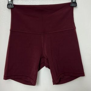Lululemon Burgundy colored High Waisted roll down shorts. Barely Used